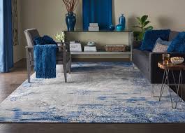 Cool and neutral grey rugs, as well as silver rugs, work well with warmer neutrals and can be mixed with browns from leathers and natural or wooden textures. Twilight Twi22 Blue Grey Area Rug
