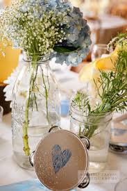 Peach bouquets were made for a spring or summer weddings. Blue Yellow Vintage Cape May Wedding Blooms By The Box