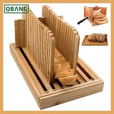 Whether you want a rustic bread box or a more modern style, today's versions often come with unique features, including a cutting board for a lid, a clear window or a matching bread knife. China High Quality Bamboo Bread Cutting Board With Wooden Bread Serving Tray China Kitchenware And Slicer Guide Price