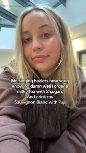 Singing Hozier's New Song in a Chic Indoor Setting