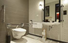 For commercial bathrooms with multiple toilet stalls and handicap the rules change a little: Pin By Farah Kamal On Removable Support Bars And Rails Clever Hinged Rails For Hotels Doc M Packs At Home Accessible Bathroom Toilet Design Handicap Bathroom