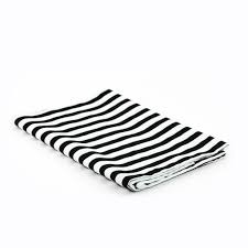 Whether you're dressing up the dinner table for a festive family feast, or looking to add some color to your patio table, tossing on a table runner is the perfect way to make a big splash. Table Runner Black And White Striped Mask Events