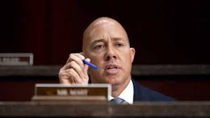 He's dismantling our democracy': Protesters in Stuart demand town hall with  Congressman Brian Mast