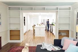 My first tip may surprise you. Adding Built In Bookshelves Around Our Living Room Doorway Young House Love