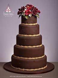 Chocolate Brown Cake With Gold Trim And Red Burgundy Sugar Flowers Wedding Cake Red Chocolate Wedding Cake Cake