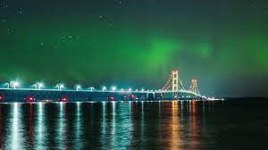 The world's longest suspension bridge connecting mackinaw city in the south with st. Northern Lights Over Michigan S Mackinac Bridge Youtube