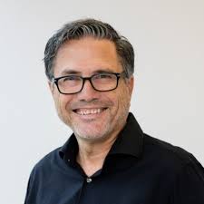 Two of us ex-Illumina folk wearing our branded Patagonia jackets