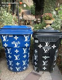 Kim Kardashian S Louis Vuitton Trash Cans Are The Definition Of Extra Trash Cans Louis Vuitton Trash Can