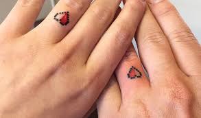 15 Wedding Tattoos To Consider Getting On Your Big Day Cause Nothing Says Forever Like Permanent Ink Wedding Band Tattoo Tattoo Wedding Rings Wedding Ring Tattoo