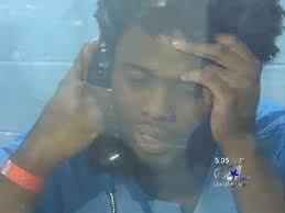 Amos J. Wells, alleged Texas triple murderer, turns himself in, police say 