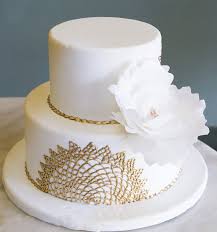 A Simple White Wedding Cake With Touches Of Gold Cake 175 Cake Designs Cake White Wedding Cake