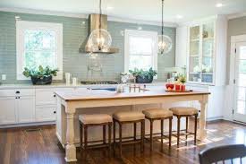 Kitchen No Upper Cabinets Sink In Island Stove Right Behind It With Hood Windows On Each Side Leaded Glas Home Kitchens Fixer Upper Kitchen Kitchen Layout
