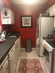 This bright yellow color on the walls works perfectly with brown tiles or wood on the floor. Kitchen Paint Color Help