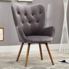 You often see them upholstered in leather and accented with matching nail head trim. Roundhill Furniture Doarnin Contemporary Silky Velvet Tufted Button Back Accent Chair Mauve Walmart Com Walmart Com