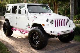 White Jeep Wrangler With Pink 2025 Accents