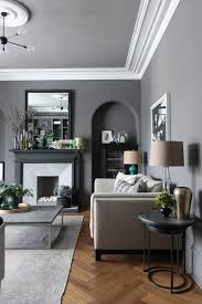Dark gray hardwood flooring works perfectly with the gray walls. 35 Gorgeous Grey Living Room Ideas Paint Colours Carpet And Furniture