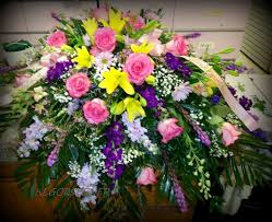 Maybe you would like to learn more about one of these? Harts Yellow Lily Spring Mixed Casket Spray Casket Flowers Funeral Flower Arrangements Funeral Flowers