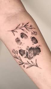 The most important thing to keep in mind when designing your paw print tattoo is that the pads and claws are accurate. 30 Paw Print Tattoos Ideas Designs Pictures Tattoo Me Now