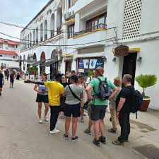 STONE TOWN ZANZIBAR: •Walking tour take you through fabled stone town,where  history appers,it is a fascinating look at the essence of ZNZ: •Stone town  building styles is unique mixture of variaus influences