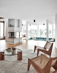 At the entry, the second floor landing was opened up to create a double height space, with enlarged windows. Joanna Laven And David Wahlgren Collaborate On Family Home In The Stockholm Archipelago Interior Design Magazine