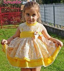 yellow embordary puffball dress handmade in spain spanish girl dress www lapetitwardrobe com puffball dresses spanish dress kids dress