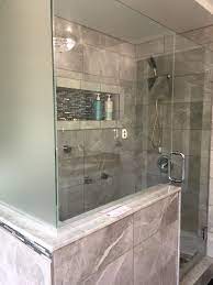 A glamorous entry to the home's basement featuring a classy rug and seats along with a small coffee table set on the side. My Finished Bathroom In A Small Space Replaced The Tub With A Short And Body Jets And A Sea Bathrooms Remodel Modern Bathroom Design Bathroom Remodel Designs