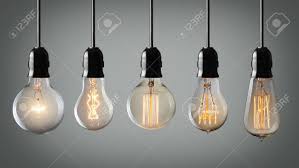 Vintage Hanging Light Bulbs Over Gray Background Stock Photo Picture And Royalty Free Image Image 49893462