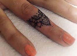 35 Wedding Ring Tattoos Jpg 600 434 Pixels Knuckle Tattoos Finger Tattoos Finger Tattoo For Women
