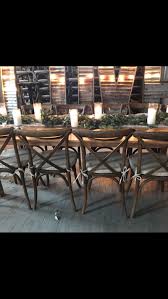 The cross back farm chair is an ideal addition to any farm or rustic themed event you may be planning. Cross Back Chairs Blossom Farm Wedding Rentals