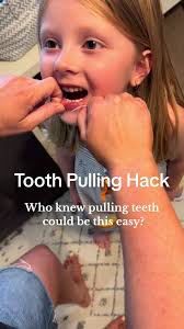 Shes was quite literally too stunned to speak… 🦷 #loosetooth #pullingteeth  #momhack #toothfairy #momlifebelike #firstlosttooth #momwin #sahmlife  #parenthacks #babyteeth