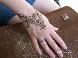 Henna paste is applied to the skin using a cone, brush, or pen. Henna That Ll Leave A Mark Allears Net