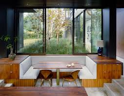 So my client's sunken living room, which was off the main entry, opened up to the kitchen/breakfast room. Dining Room Idea Create A Built In Dining Nook 8 Pictures
