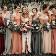 Mismatched Bridesmaid Dresses Using A Muted Colour Palette Of Greys Neutrals And Red Bridesmaid Dress Colors Orange Bridesmaid Dresses Orange Wedding Colors
