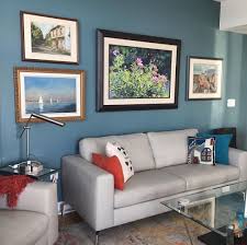 Sw Mediterranean 7617 Serves As The Perfect Backdrop To This Gallery Wall W Paint Colors For Living Room Living Room Paint Color Inspiration Living Room Inspo