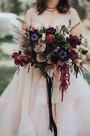 Maybe you would like to learn more about one of these? Pampas Grass Wedding Ideas The Lyons Farmette Jill Houser Photography Dark Purple Wedding Wedding Bouquets Colorado Wedding Planner