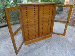 This cabinet from the estate collection is the solution to your kitchen pantry, laundry room, garage, bedroom, bathroom storage needs and more! The Ultimate 40 Drawer Butterfly Collectors Cabinet By Thomas Gurney With Collection 251578 Sellingantiques Co Uk