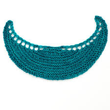 Crescent shaped shawl knit from the top down with eyelet stripes with a flame or leaf shaped lace border. Ravelry Easy Crescent Shaped Shawl Pattern By Barbara Benson