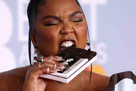 Missy elliott and lizzo team up on new song tempo: Lizzo Sparks New Weight Fears In Hershey Chocolate Wrapper Dress