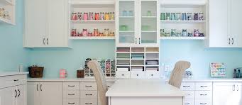 A central island welcomes artists with a broad work space and plenty of storage in undercounter drawers. Craft Room Storage Ideas Organization Systems California Closets