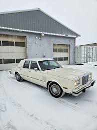 Image result for White 1985 Chrysler