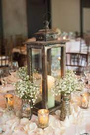 20 Rustic Wedding Centerpiece Ideas Wedding Floral Centerpieces Lantern Centerpiece Wedding Wedding Centerpieces