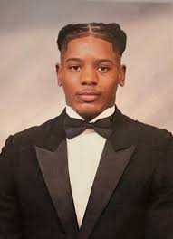 Student graduates from Somerset College Preparatory Academy