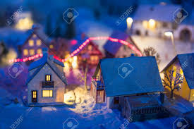 Wherever you choose to position your christmas village miniatures, it is essential that you start off with a solid and stable base. Miniature Houses In Europe Village Covered By Snow At Night With Stock Photo Picture And Royalty Free Image Image 99161037