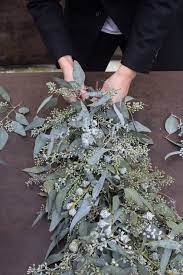 The Great Ally Eucalyptus Trees And Garlands Centers Eucalyptus Centerpiece Garland Wedding Wedding