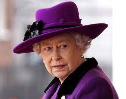 The British Monarch Looks Elegant In A Wide Brimmed Purple Hat With Black Flowers While Attending A Ceremonial W Queen Elizabeth Purple Hats Queen Elizabeth Ii
