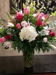 Charming and natural artificial hydrangea flowers are set in a simple round glass vase with artificial water for your convenience and display. Sensationally Stunning Large Vase Arrangement In Westerville Oh Talbott S Flowers