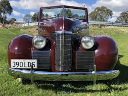 Image result for Trojan Maroon 1939 Oldsmobile