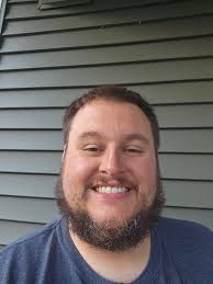 Does blues traveler member resemble another person?