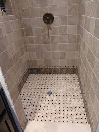 Wide turquoise glass tile border in the shower. June 2013 Bathroom Floors Bathroom Tile Collections