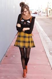 Black And Yellow Checkered Skirt Black Sheer Tights Yellow Tartan Pleated Skirt Brown Boots And Yellow Plaid Skirt Nerd Outfits Cute Nerd Outfits